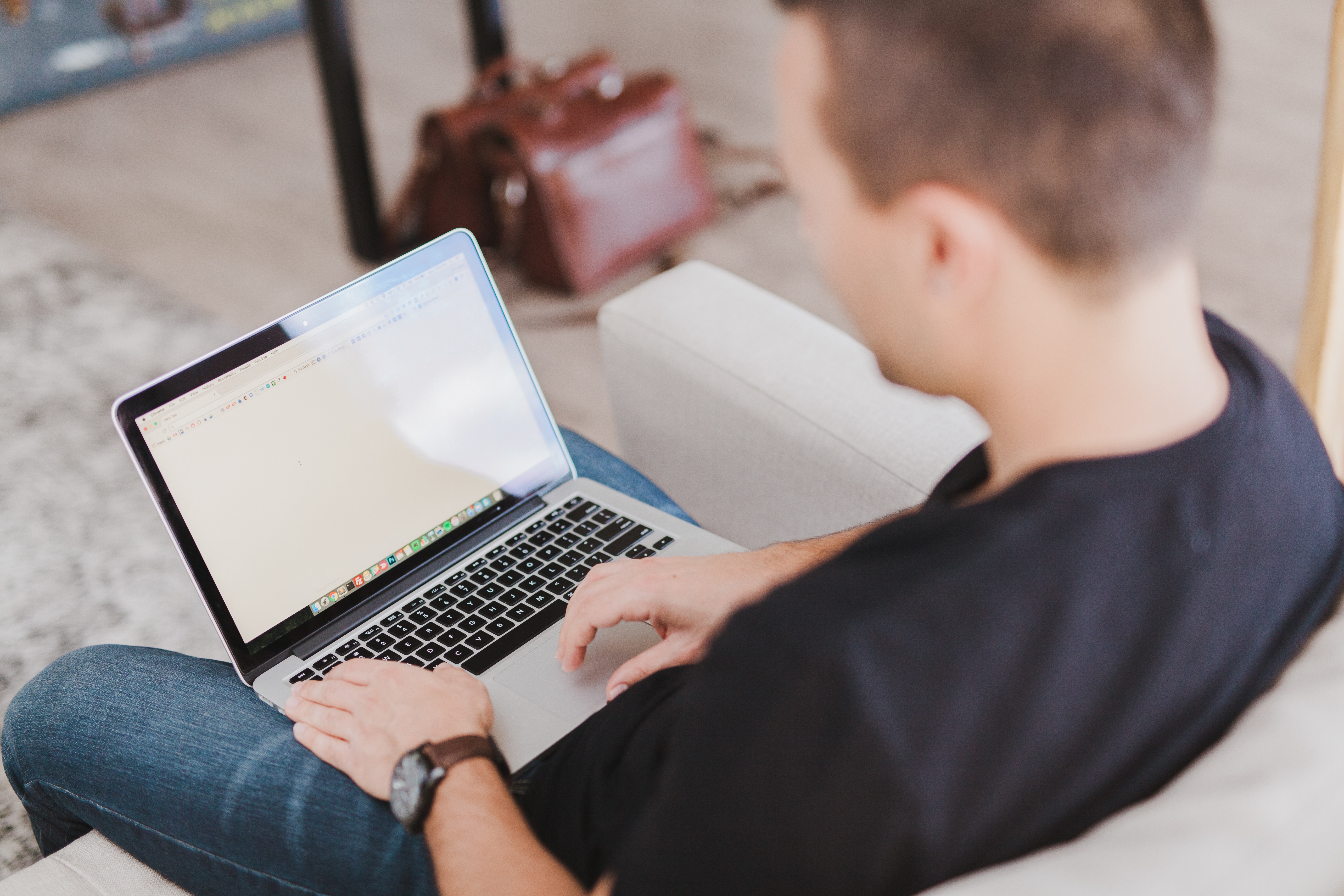 Person using a laptop at home